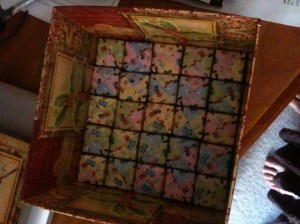 Cubes lining the bottom of the box